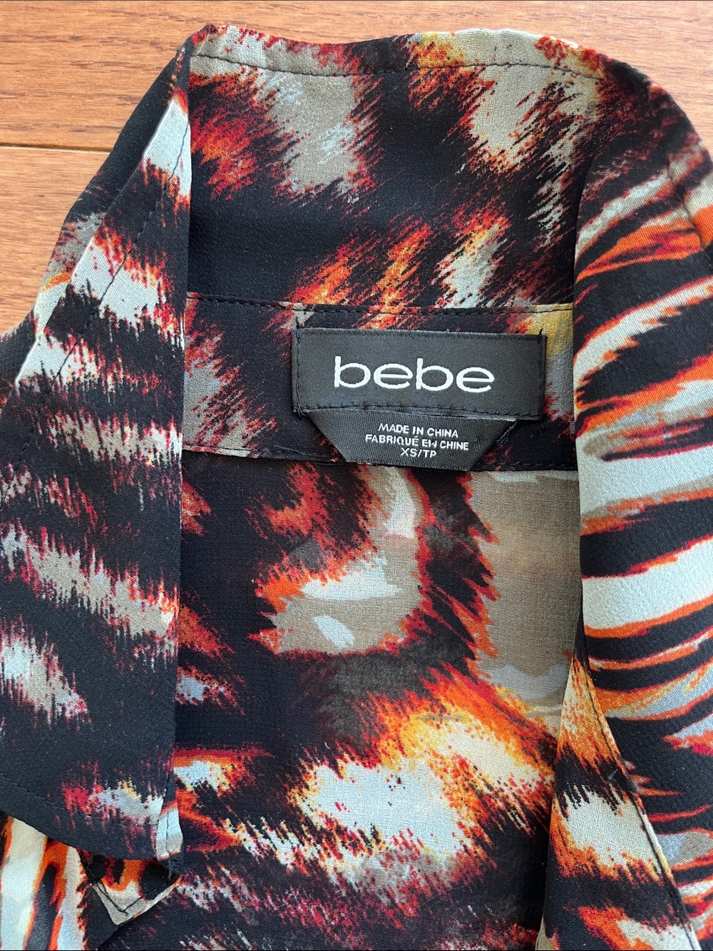 bebe Printed Twist-Front Long Sleeve Top in Multi-Color - Picture 3 of 6